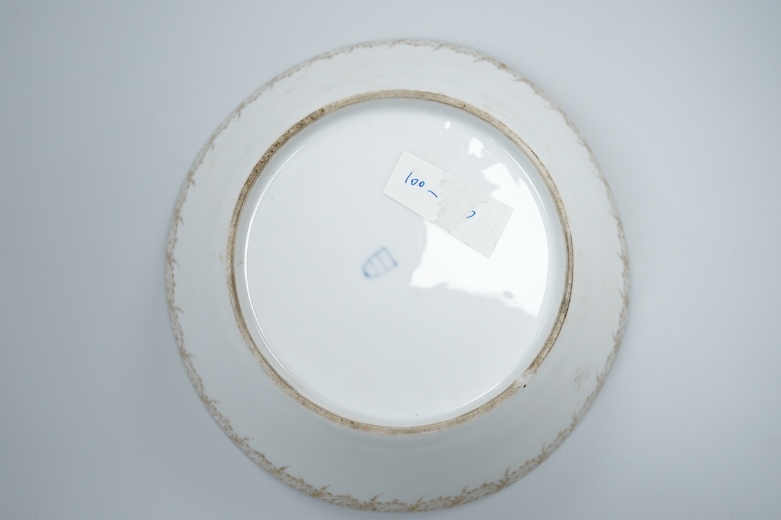 A 19th century Vienna saucer, hand painted with two figures beneath a tree, 15cm in diameter